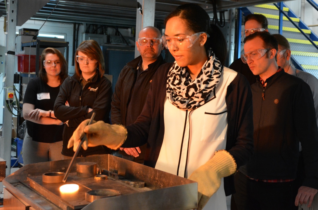 Glass appreciation course delegates take part in melting demonstration.